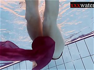 Smoking super-hot Russian red-haired in the pool