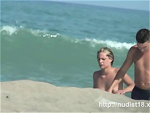naked beach voyeur shoots a super-fucking-hot honey with a hidden cam