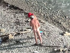 cute young teenager nudists on the beach